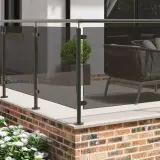 Image of a smoked glass balustrade with black posts.