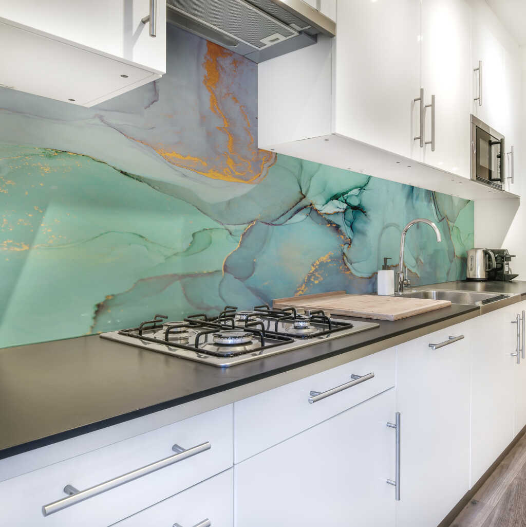A kitchen scene with Liquid Gold splashback.